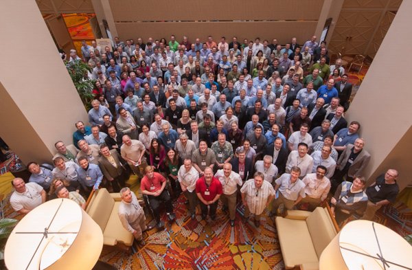 A big group photo of attendees of corporate event in Boston.