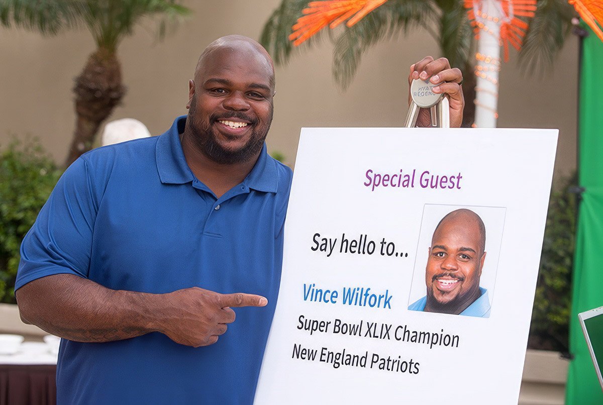 Corporate photographer Boston event with Vince Wilfork as a special guest.