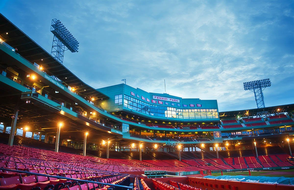 Fenway Park in Boston, showcasing the stadium's stands and lighting.