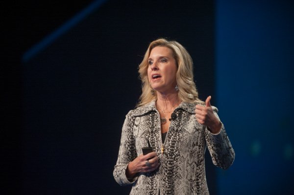 Speaker presenting at a corporate event in Boston.